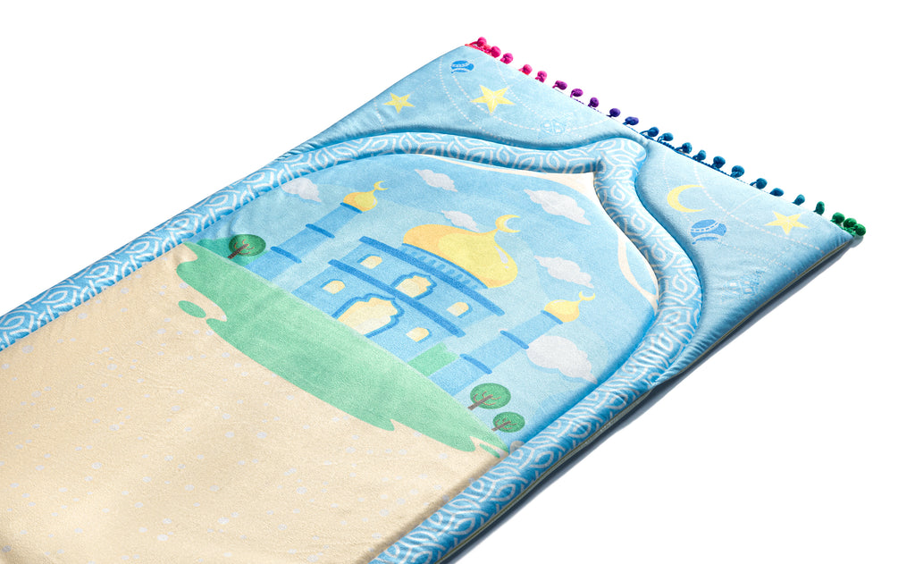 A kids' prayer mat in blue with an engraved design of a mosque | Urban Rugs KSA